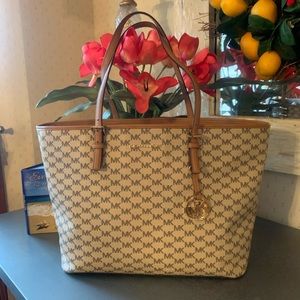Michael Kors NEW NEVER CARRIED, large multi function tote. “MK” print logo.